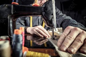 abbigliamento artigianale il sarto della nostra zona. macchina da cucire.